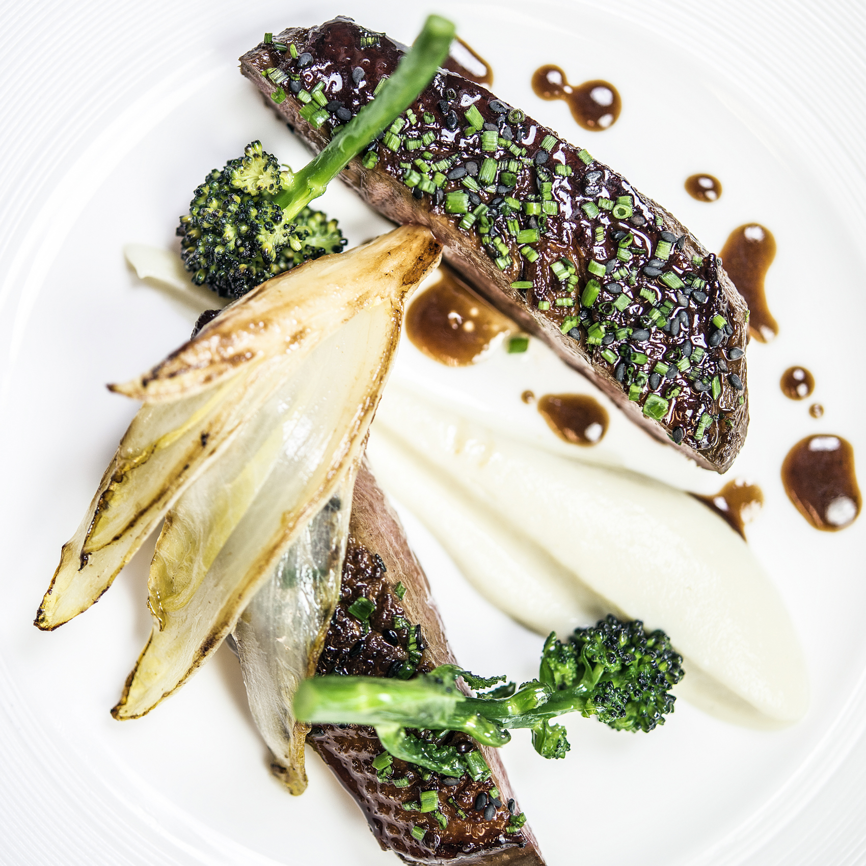Laquee Goosnargh duck with sprouting broccoli and bitter endives at Allan Pickett at Sanderson London